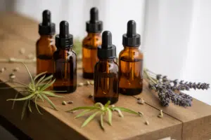 CBD for beginners - CBD oil bottles with hemp leaves wellness product